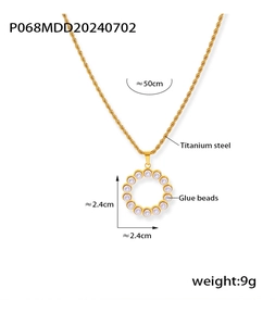 Macro shot of 2.4cm pearl circle pendant on 50cm golden titanium steel twist chain