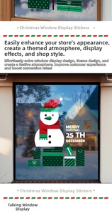 Detail of Christmas window clings featuring snowman and gift boxes on glass shopfronts