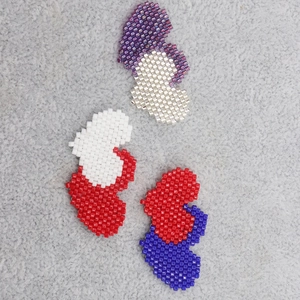 Handmade Miyuki seed bead heart pendants in vibrant color combinations for jewelry making