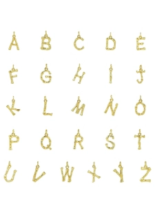 Detail view of 26 alphabet gold charms with unique bamboo texture for charm bracelets