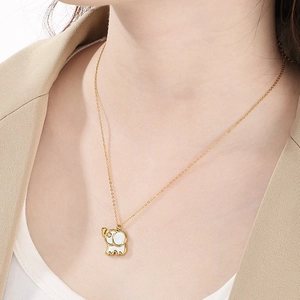 Golden necklace with a cute elephant shell pendant featuring a diamond eye detail