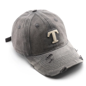 Vintage washed dark grey baseball cap with embroidered T letter and distressed torn details
