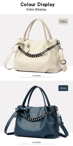 Detail of off-white and blue handbags with leather texture, bows and black metal chains