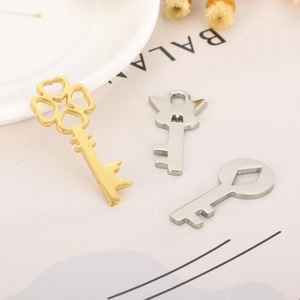 Three gold and silver stainless steel hollow heart key pendants for DIY jewelry design