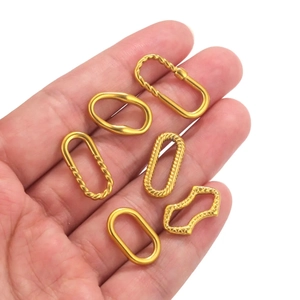 Set of six gold stainless steel oval and twisted textured earring connectors for DIY jewelry