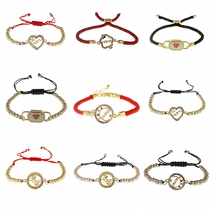 Detailed selection of woven bracelets with gold beads, zircon pendants, and MAMA heart charms