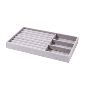 Beige velvet jewelry drawer tray with ring slots and necklace storage compartments
