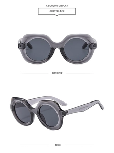 Front and side views of oversized gray transparent frames with classic black lenses