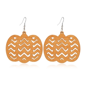 Hollow out pumpkin shaped brown wooden earrings with vintage geometric pattern on white background