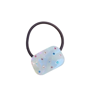 Square resin hair tie with colorful crystals and mica gloss on a black elastic band