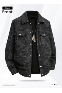 Detail of black tropical leaf print jacket with metal buttons and chest pockets