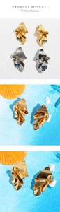 Detailed macro view of irregular crinkle texture metal earrings in gold and silver finish