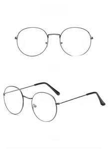 Detail view of gunmetal round metal eyeglass frames from front and 45-degree angles