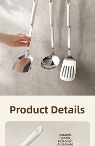 Close-up of stainless steel kitchen utensil with long ceramic heat-resistant handle