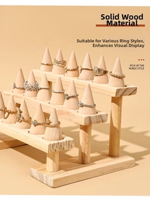 Three-tier solid wood tiered ring display stand with multiple conical holders for jewelry