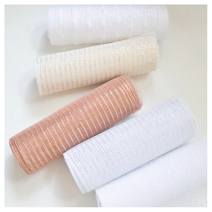 Detail of multi-color deco mesh ribbon rolls with metallic stripes for Christmas tree