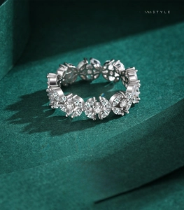 Macro shot of 925 sterling silver ring with marquise and round cut pavé crystals
