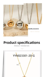 Detail of 2mm thick 18K gold plated ball pendant necklace with polished mirror finish