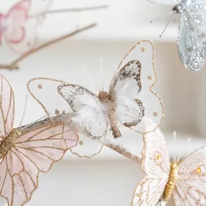 Glittery mesh butterfly Christmas ornaments with feathers for festive tree decoration