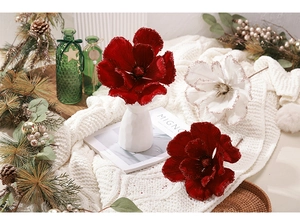 Close-up of 25cm glitter poinsettia artificial flowers in white and burgundy for Christmas