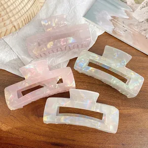 Set of iridescent large hair claw clips with pearlescent finish in rectangle design