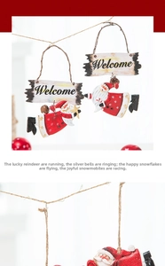 Detail of Christmas welcome sign pendant with Santa Claus doll for festive tree decoration
