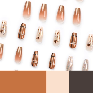 Long coffin autumn press-on nails featuring brown gradient and maple leaf glitter patterns