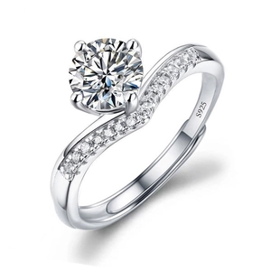 Macro shot of S925 silver ring with a large round moissanite and side stones