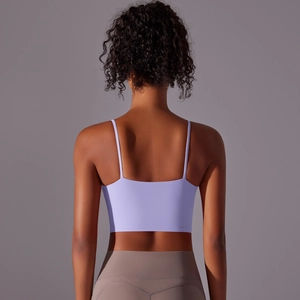 Close-up of lavender yoga tank top featuring thin straps and supportive matte fabric