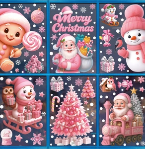 Detailed view of pink cartoon Santa and gingerbread man static window stickers on glass