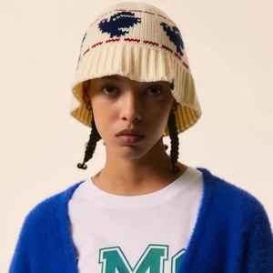 Winter crochet knit bucket hat featuring blue camel patterns and ribbed trim for warmth