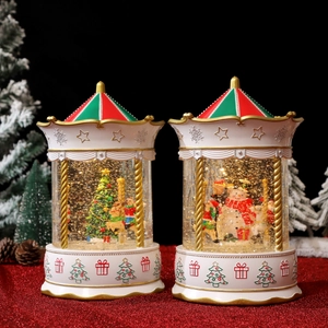 Christmas carousel snow globe set with music, festive LED lights and rotating glitter tree