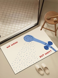 Detail of absorbent diatomite bathroom mat with blue shower pattern and soft texture