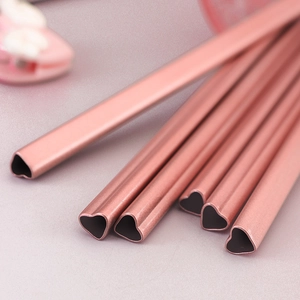 Set of 6 rose gold heart-shaped 304 stainless steel drinking straws on a neutral surface