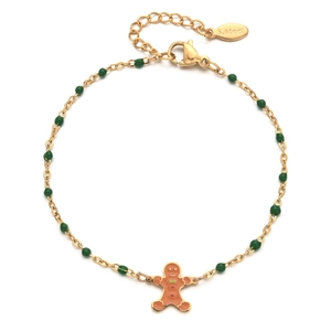 Detail of stainless steel gold chain bracelet with green beads and gingerbread man charm