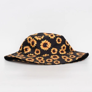 Close-up of black sun hat featuring detailed sunflower patterns and sun protection fabric