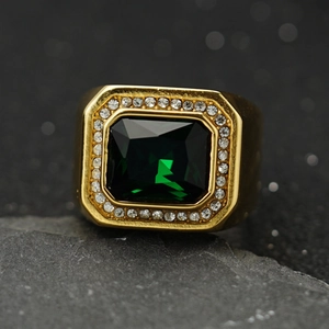 Gold stainless steel men's ring featuring a large emerald-cut green stone and diamonds
