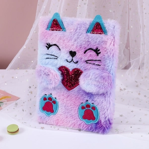 Close-up of unicorn plush notebook with colorful gradient faux fur and sequin details