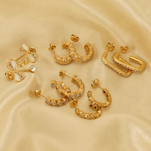 Detailed set of five 18k gold plated stainless steel earrings with zircon inlay and silk