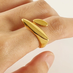 Polished 18k gold plated stainless steel geometric open ring worn on female hand