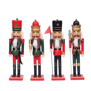 Set of four 38cm wooden nutcracker soldiers in festive red and gold for Christmas decor
