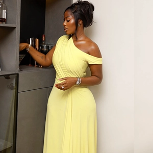 Elegant bright yellow one-shoulder ruched maxi dress featuring a slim fit A-line silhouette