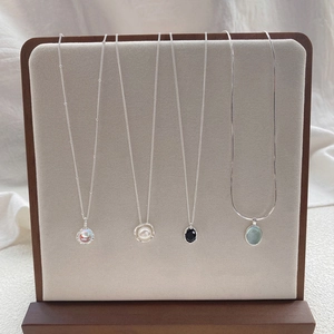 Elegant collection of S925 sterling silver necklaces featuring pearl and gemstone pendants