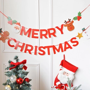 Merry Christmas banner with Santa Claus, reindeer, and snowman hanging on a white wall