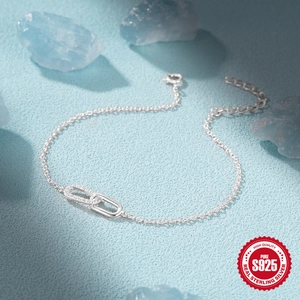 Elegant S925 sterling silver interlocking double ring bracelet with cubic zirconia accents