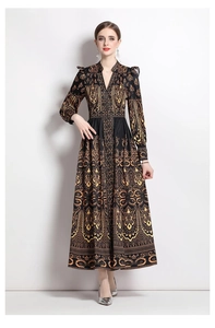 Detail of vintage V-neck maxi dress featuring baroque gold prints and lantern sleeves