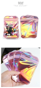 Detailed holographic laser zip-lock bag showing metallic pink luster and hanging hole