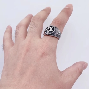 Mens vintage stainless steel pentagram ring featuring retro star relief carvings