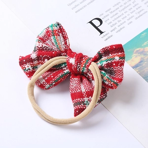 Christmas red and green plaid bow baby headband made of soft nylon and elastic fiber