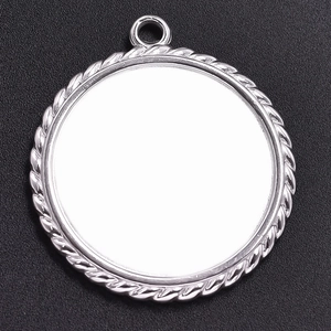 Macro shot of silver round bezel tray with twisted rope edge for DIY jewelry making